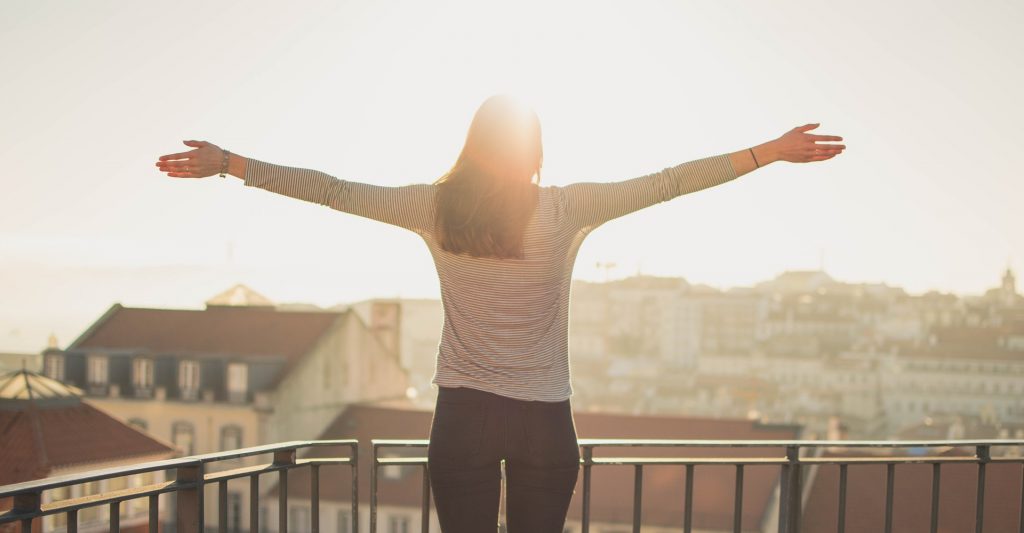 woman standing in balcony