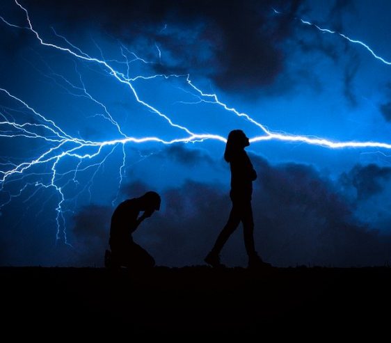 silhouette of a couple breaking up 