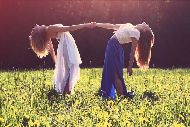 two women in a meadow