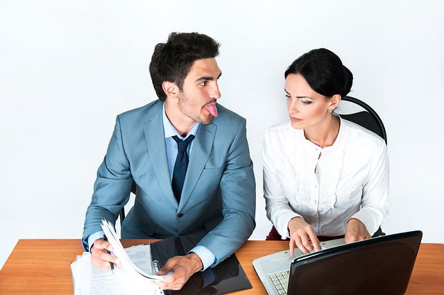 man making face to a woman