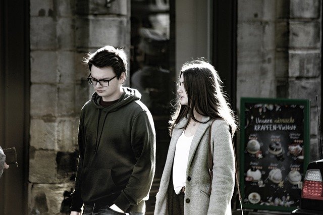 couple having disagreement walking