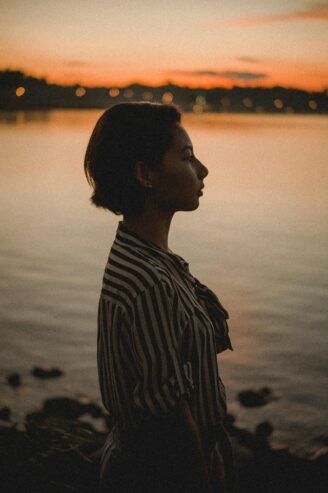 side view photo of a woman during dawn