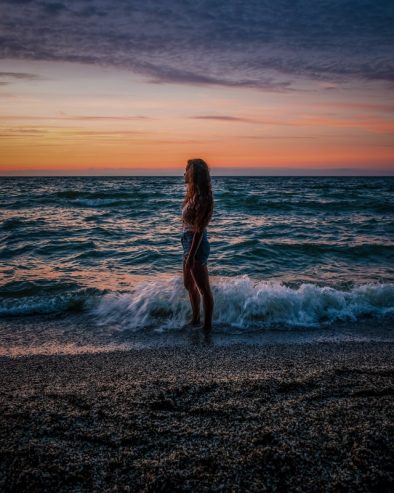 woman near waving sea