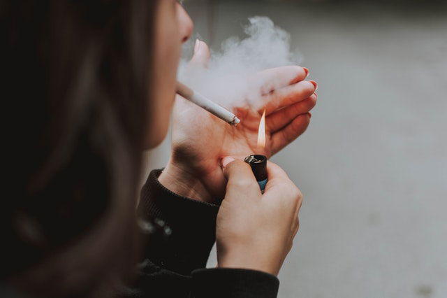 person smoking cigarette 