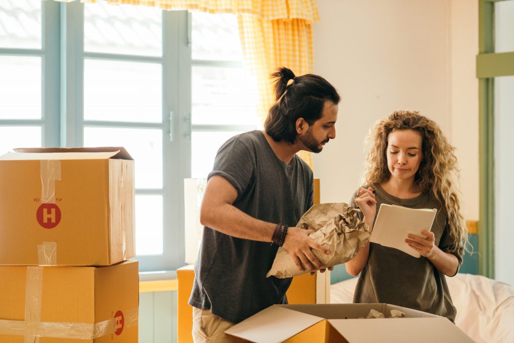 a couple packing goods