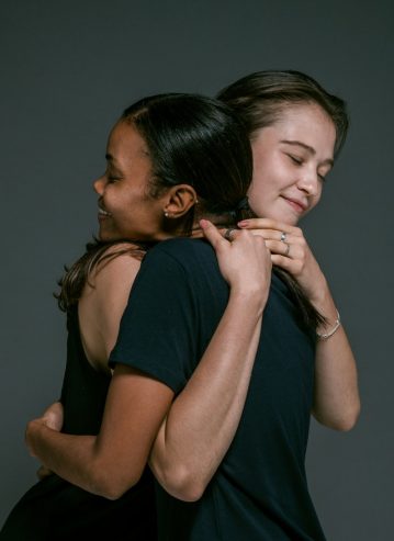 happy women hugging 