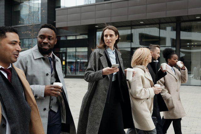 co-worker friends taking coffee break