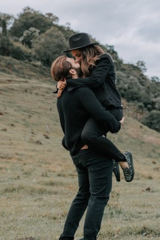 man carrying woman 