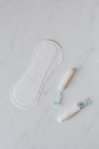 feminine hygiene products on marble table 