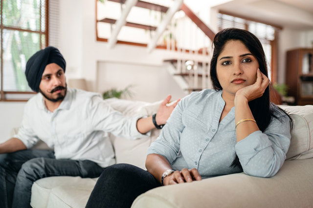 young Indian couple having argument at home 