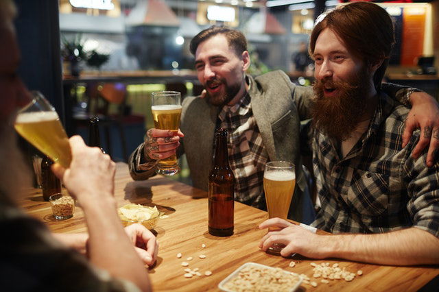 friends drinking at the bar