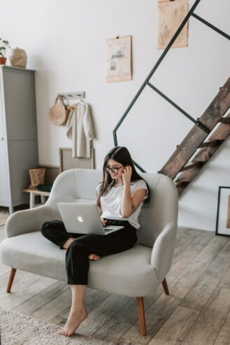 woman watching movie on her laptop 