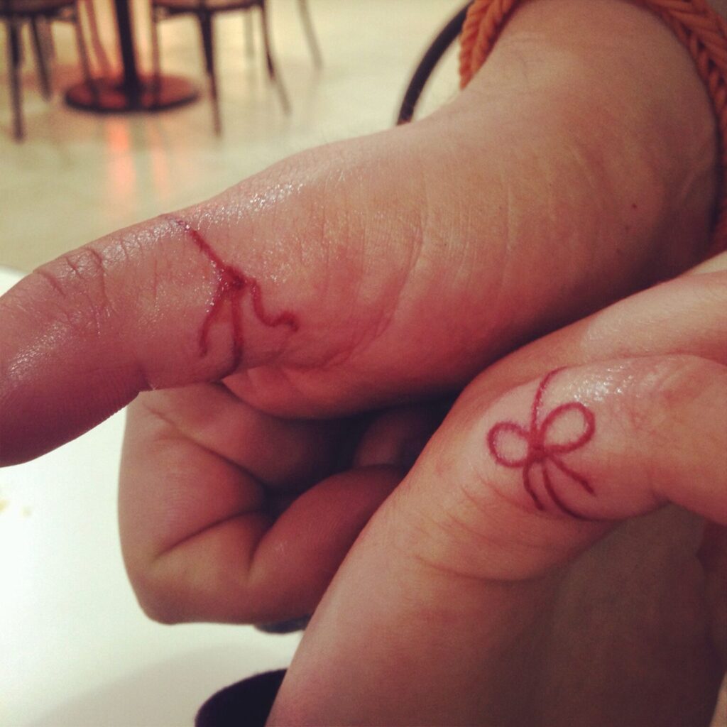 Red String Tattoo